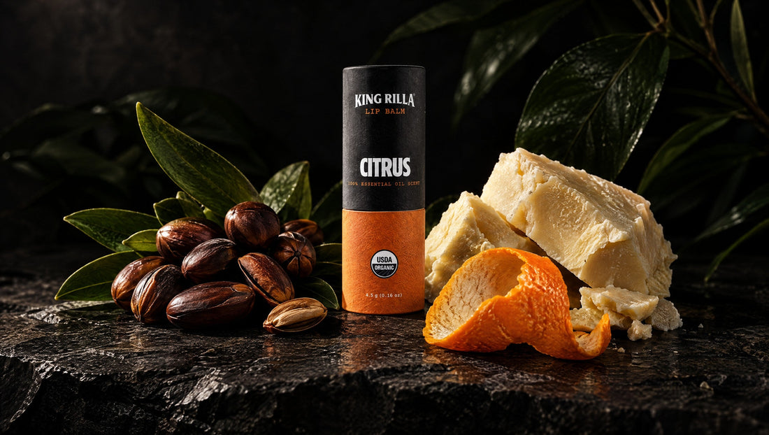 King Rilla Citrus lip balm with cosmetic ingredients on dark stone.