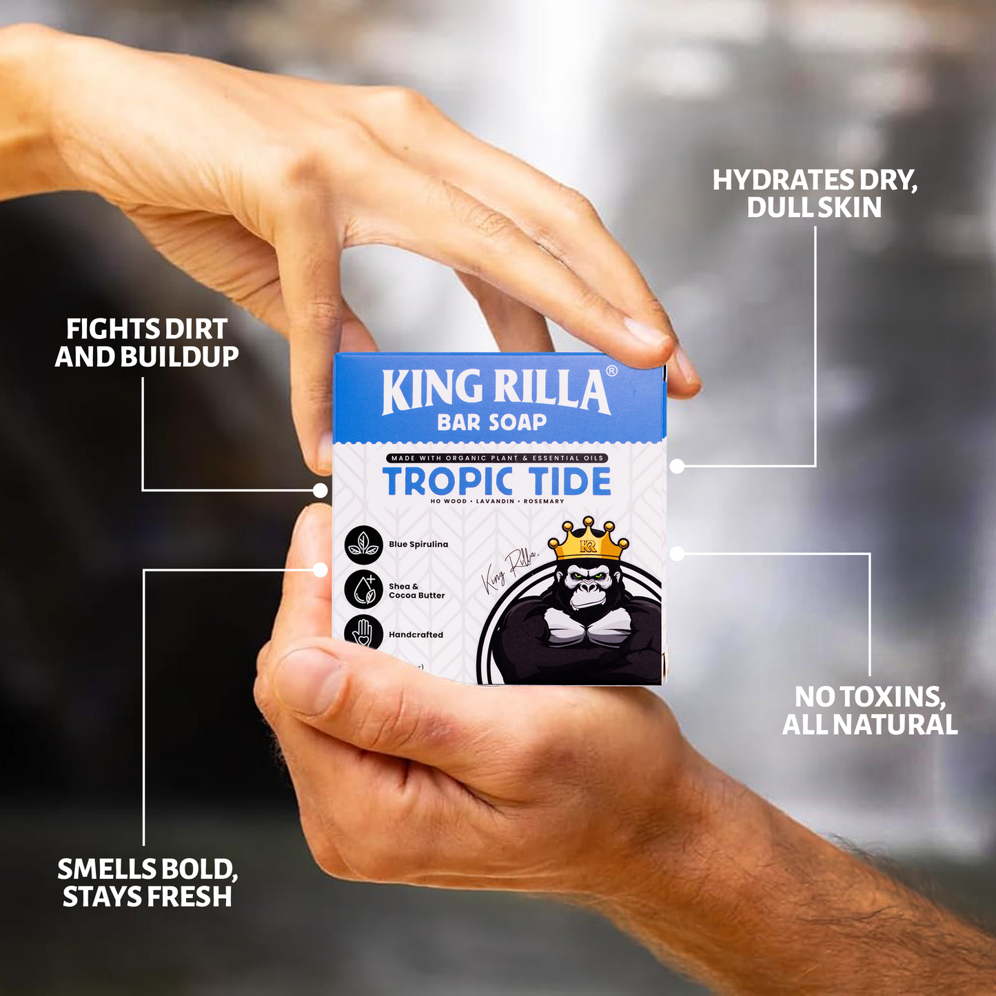 Hand holding King Rilla Tropic Tide bar soap with product features highlighted.