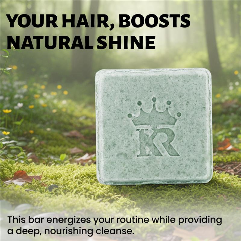 Bar of soap with a logo on a grassy background, promoting natural hair care.