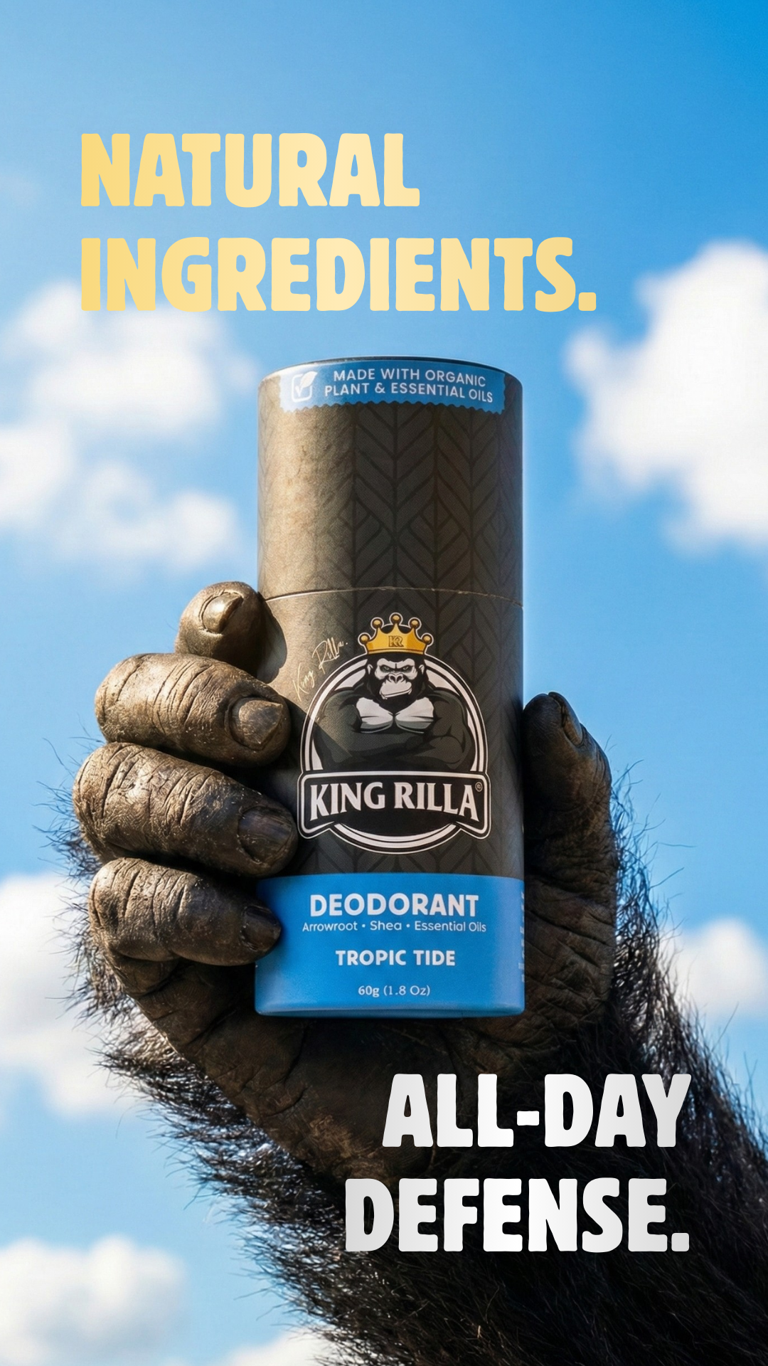 Hand holding a King Rilla deodorant can with a blue sky background