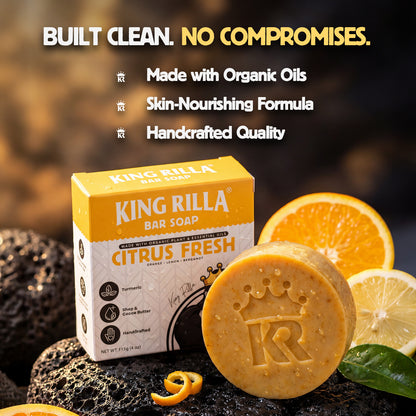 King Rilla Citrus Fresh bar soap with packaging, surrounded by oranges and lemons on a dark background.