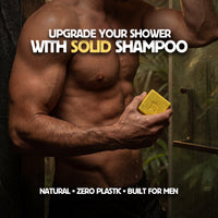 Man holding a bar of solid shampoo with promotional text in a shower setting