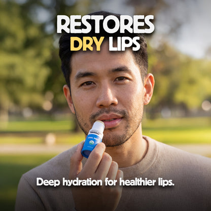 Man holding a lip balm with text 'RESTORES DRY LIPS' and 'Deep hydration for healthier lips.' in an outdoor setting.
