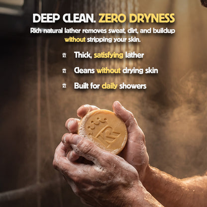 Hand holding a bar of soap with text about deep cleaning and zero dryness.
