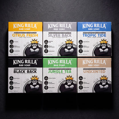 Six King Rilla bar soap packages with different scents on a dark background