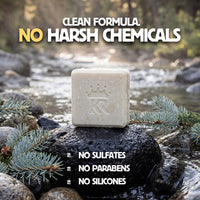 Bar of soap on a rock with a natural background and text highlighting product benefits.