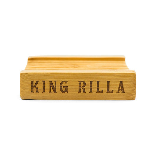 Wooden bambu block with 'KING RILLA' engraved on a white background