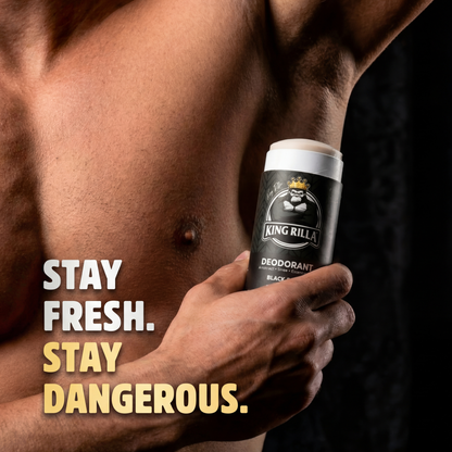 Person holding a King Rilla deodorant can with text 'Stay Fresh. Stay Dangerous.'