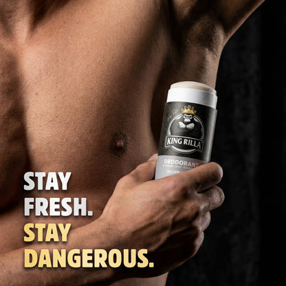 Person holding a King Rilla deodorant can with text 'Stay Fresh. Stay Dangerous.'