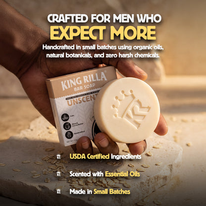 Hand holding King Rilla bar soap with product packaging, set against a neutral background.