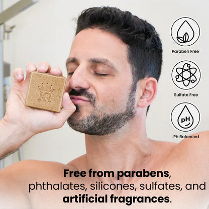 Man holding a bar of soap with product features highlighted on the right.