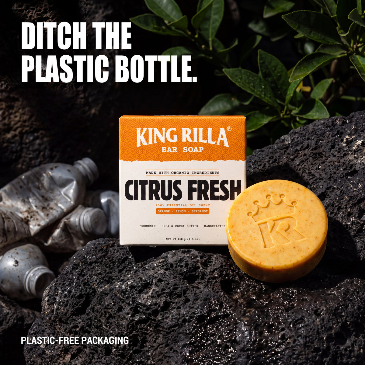 Citrus Fresh soap and plastic-free carton beside discarded plastic bottles
