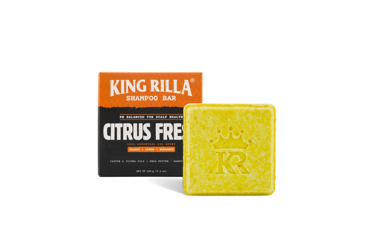 King Rilla Citrus Fresh shampoo bar beside its box on white
