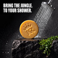 Jungle Tea bar soap in a dark volcanic stone shower