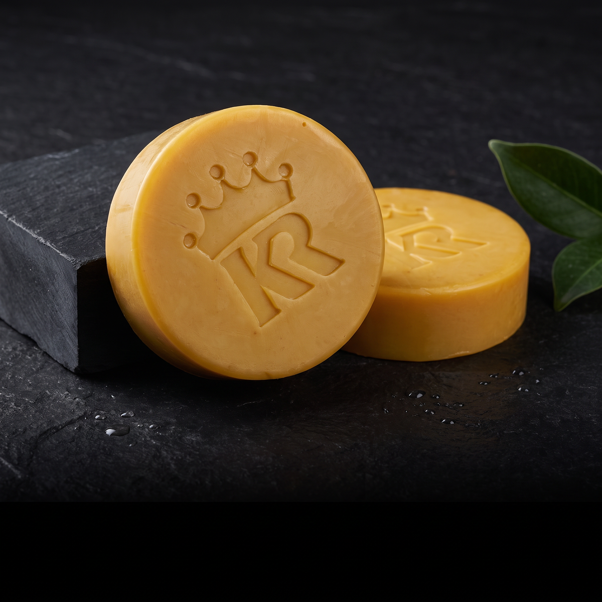 Golden King Rilla soap bars on dark stone