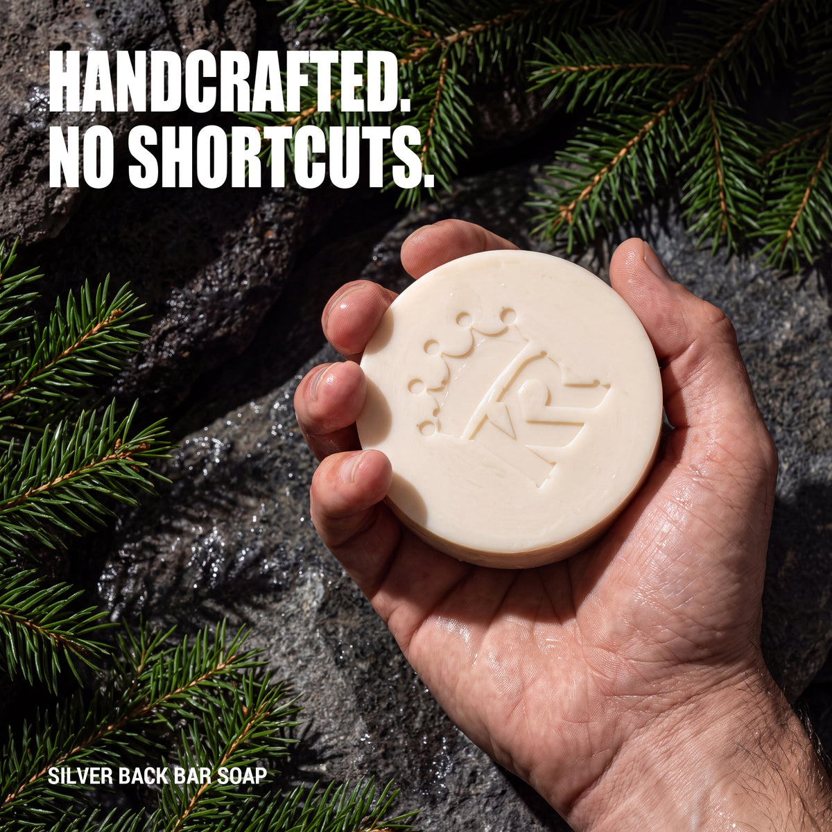 Palm holding a substantial handcrafted Silver Back soap bar