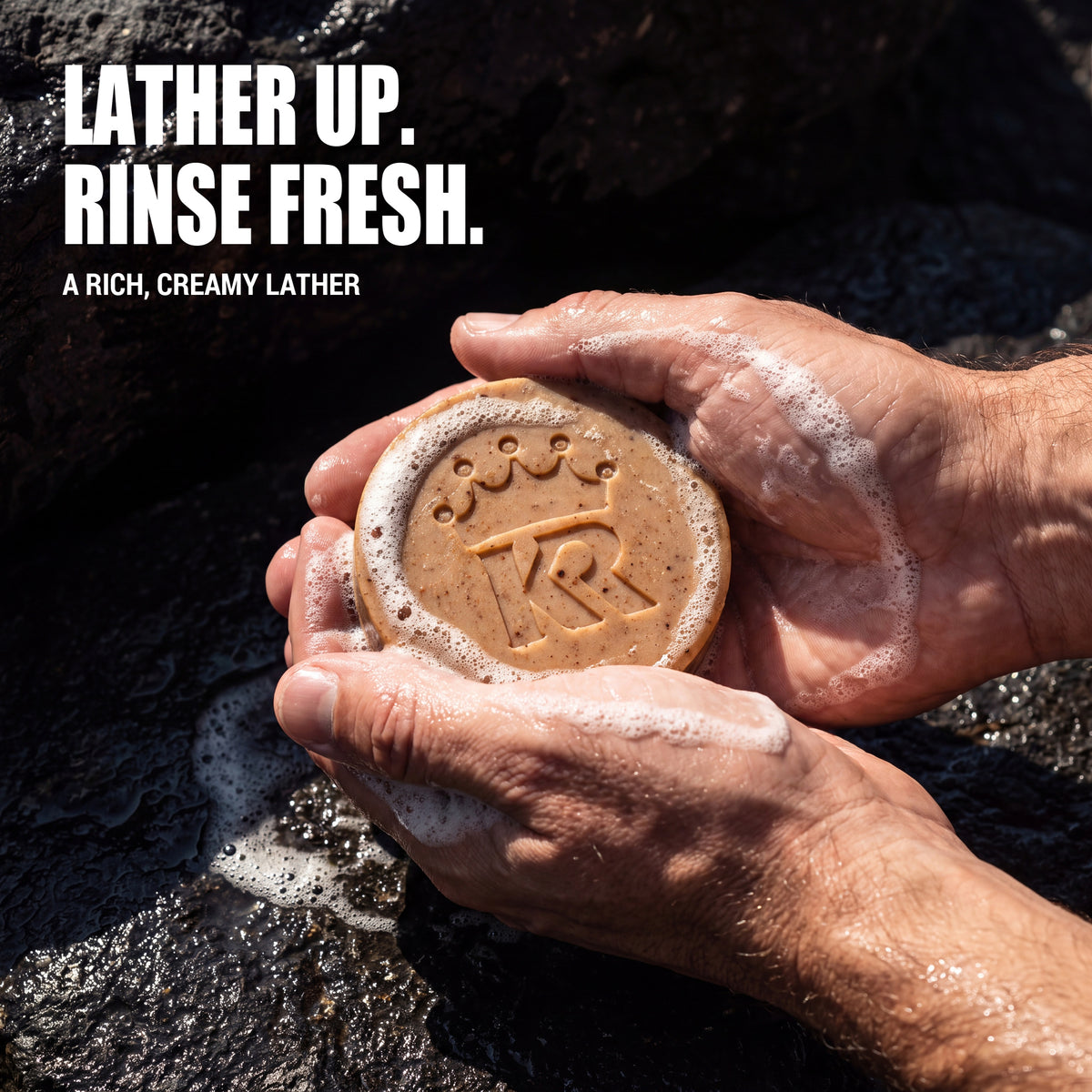 Hands lathering Spruce Noir bar soap