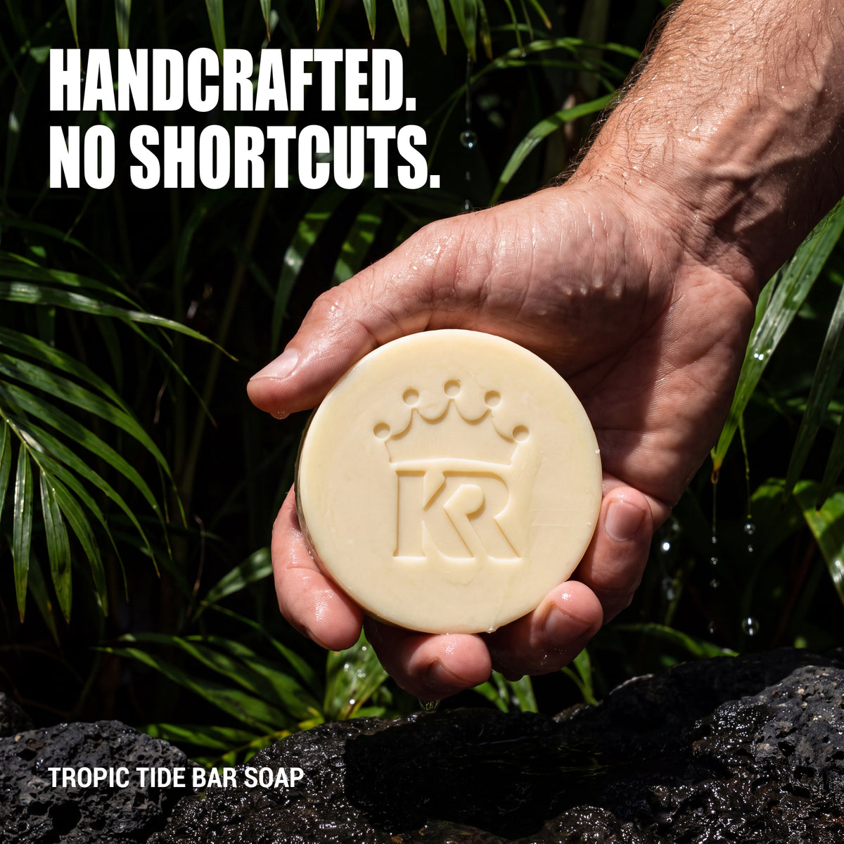 Handcrafted Tropic Tide soap held in a man's hand