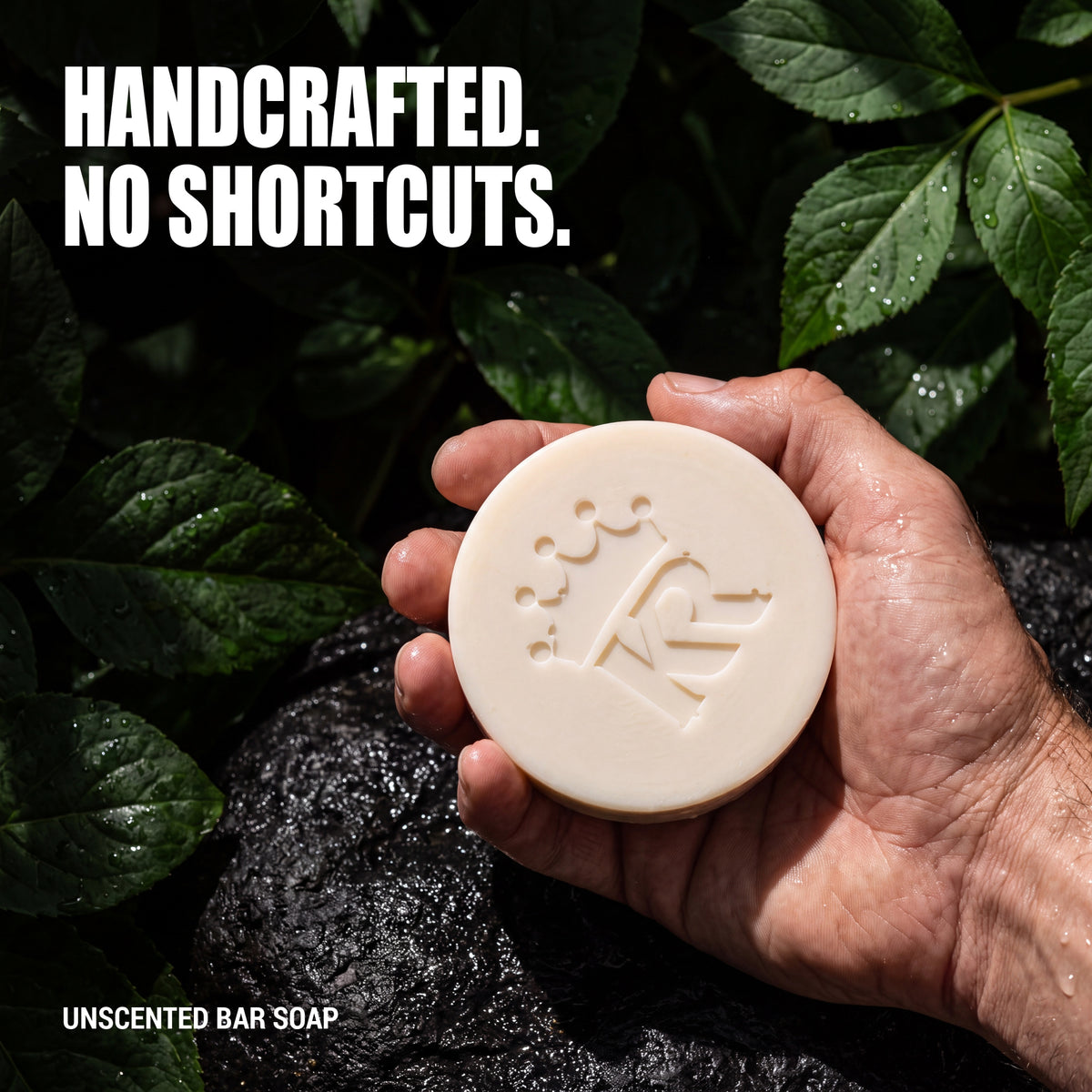 Hand holding handcrafted King Rilla Unscented bar soap